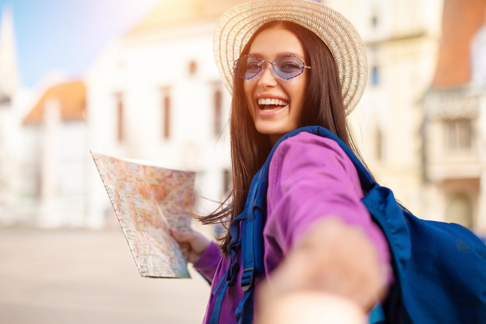 A traveller discovering a destination with a map